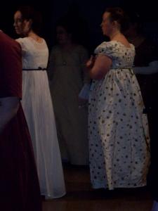 Aylwen's gown (right) was made of a lovely embroidered silk in fall colors. You can also see the back of Rebecca's lovely white muslin gown in the center.