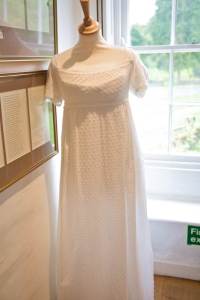 A very pretty dotted Swiss bib-front gown in the back hallway upstairs.