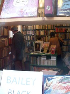 Peering through the shop window.