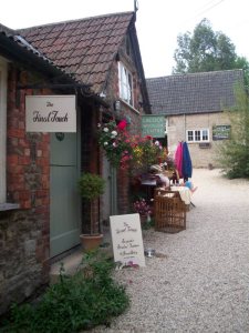 Looking up the alleyway next to The George Inn towards the woolen shop.
