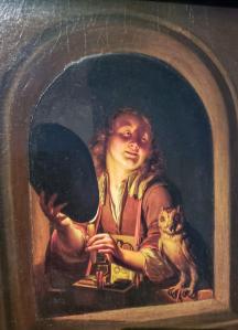 Girl with owl in candlelight