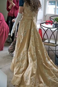 Now Cassie sweeps 'round the room to give us all the complete view...