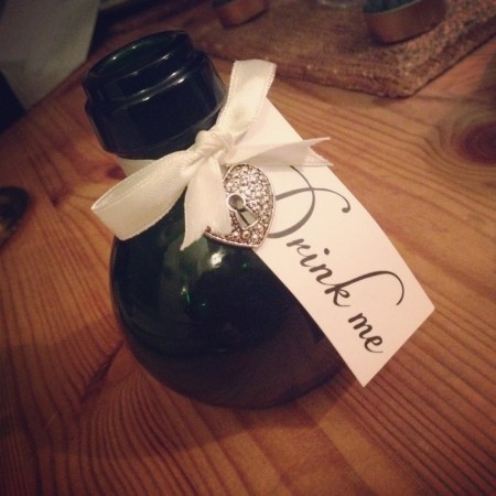 The theme for the 2014 Masquerade Ball was Alice in Wonderland, and I made myself a Tenniel-inspired Alice costume. Can you believe Cathy spotted this for me to carry? Wheee!