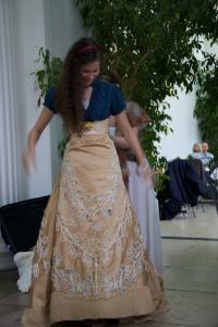 Then the incredible skirt with hand-applied oak leaves over Duchesse satin...