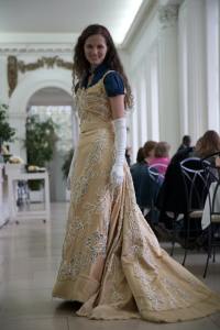 Cassie goes out into the long Orangerie hall for the runway effect. Stunning!